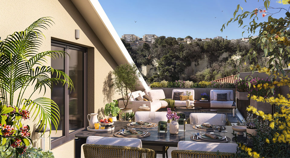 Terrasse en attique du programme neuf NICE CENTRE Cyrille Besset avec vue dégagée sur les toits de Nice